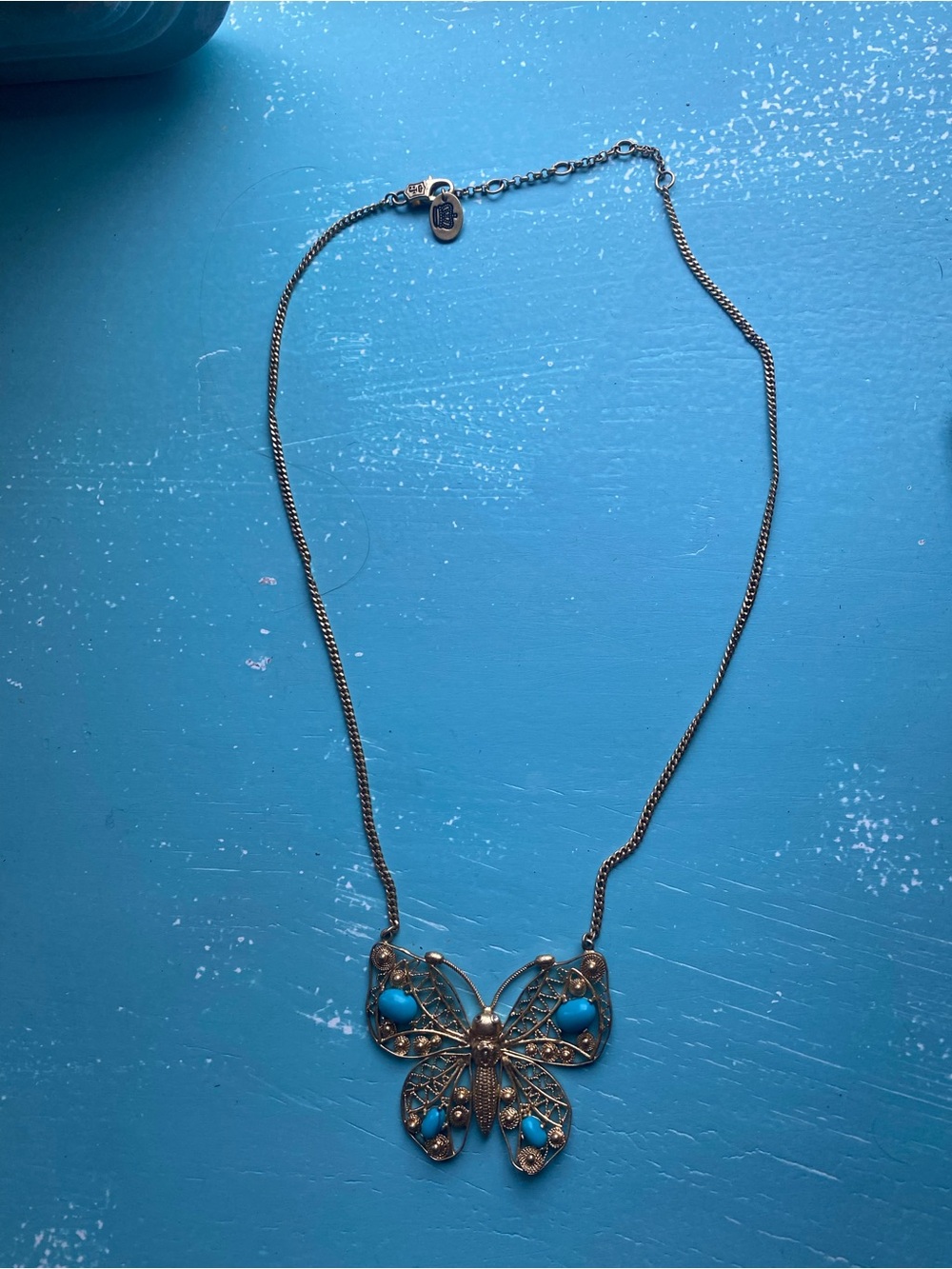 Juicy Couture Gold Butterfly Necklace with Turquoise Accents